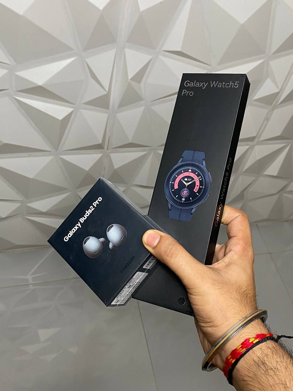 Samsung Galxay watch and Airpods