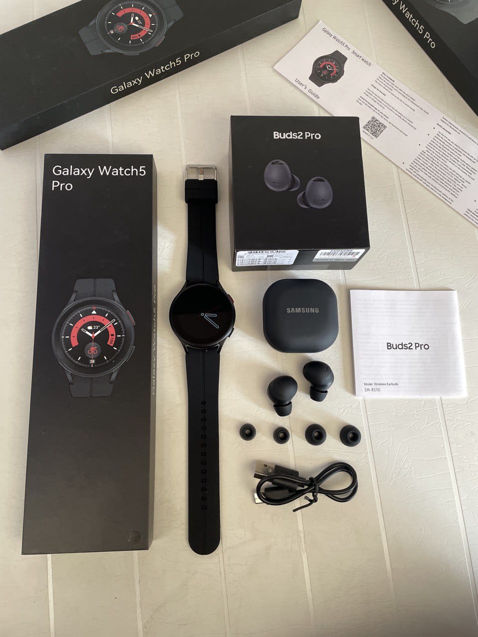 Samsung Galxay watch and Airpods