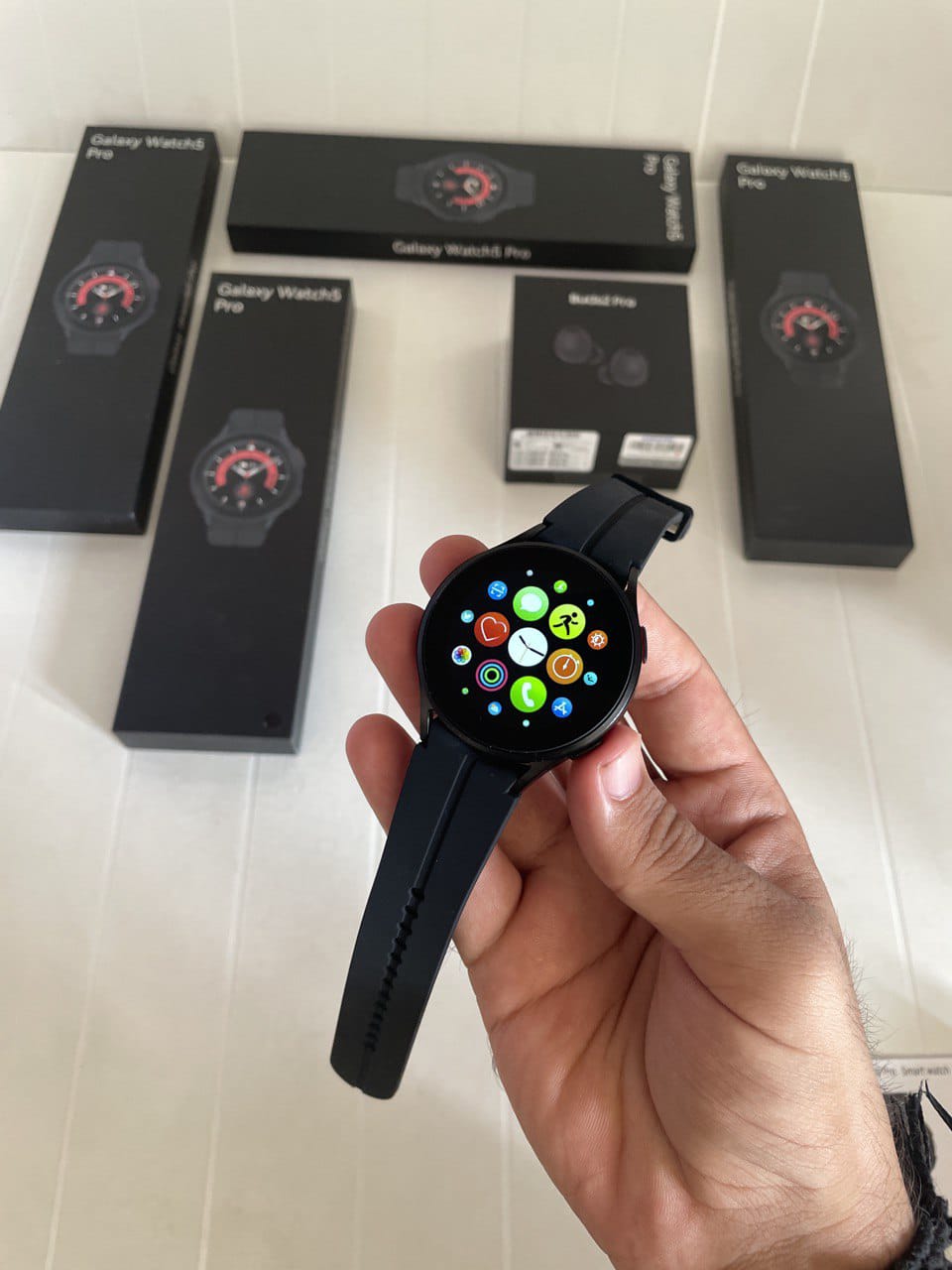 Samsung Galxay watch and Airpods